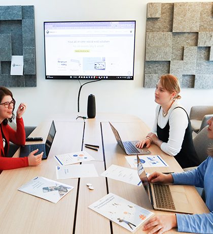 team reviewing editorial calendar