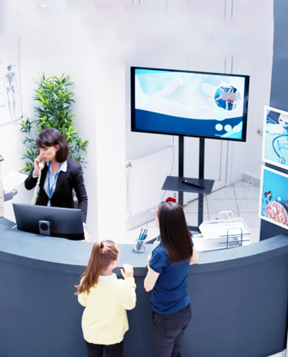 local business reception desk with signage